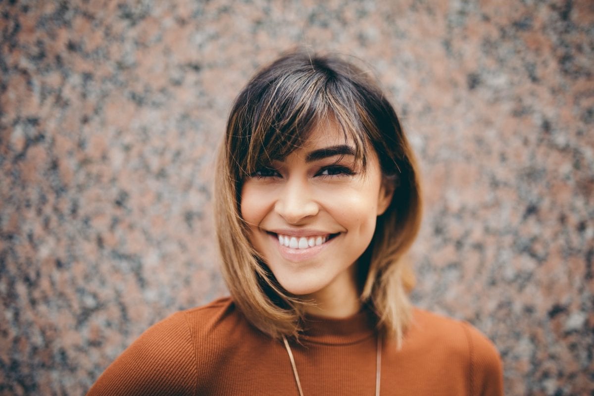 Young woman with confidence after braces